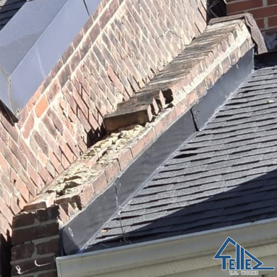 Damaged chimney brickwork with missing bricks and failing flashing in Toronto