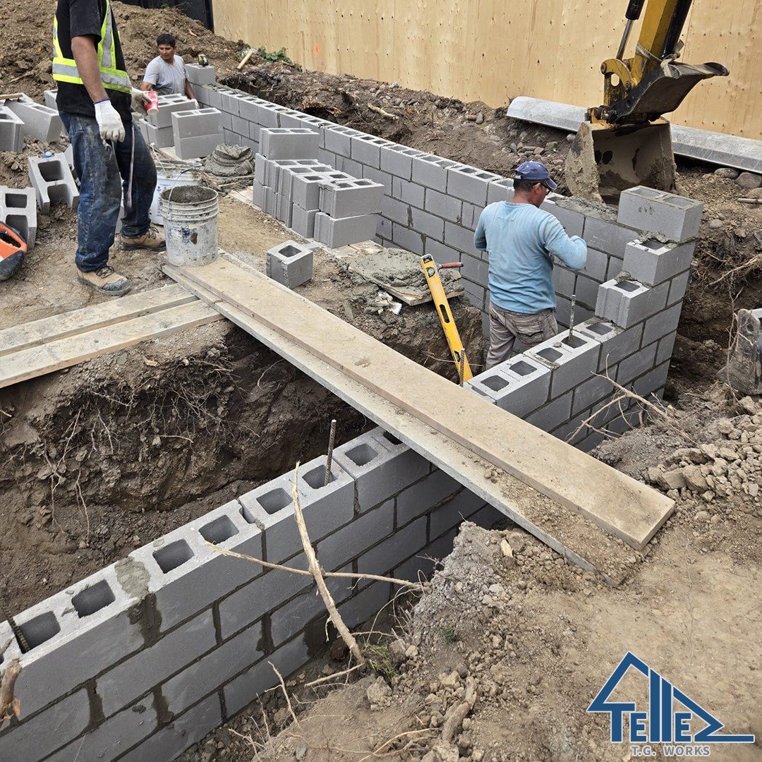 TG Works crew pouring concrete slab with in-floor radiant heating in Toronto