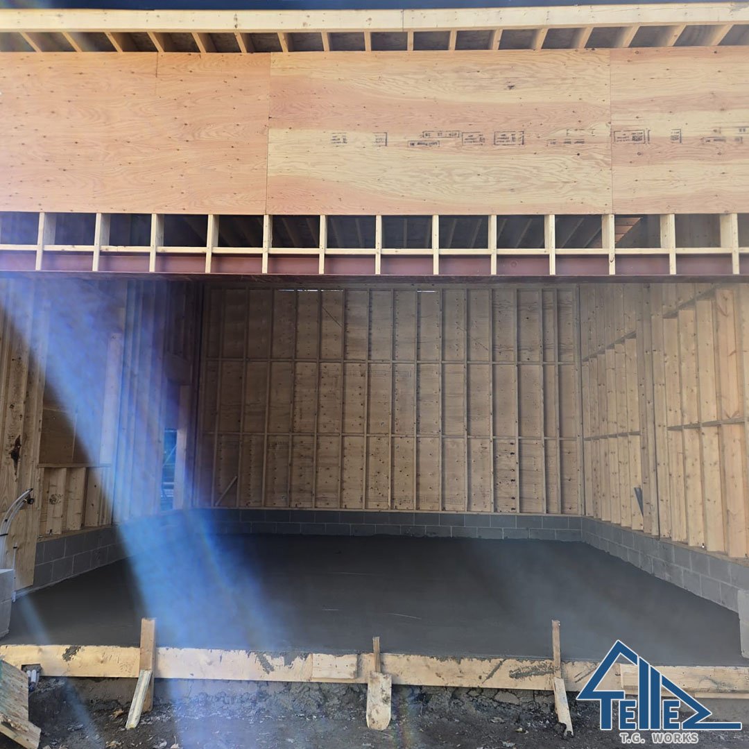 Finished concrete slab inside framed custom garage structure in Toronto