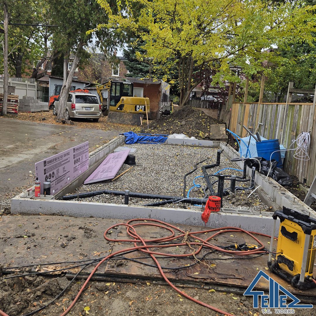 Foundation block walls with gravel base and plumbing rough-in by TG Works in Toronto