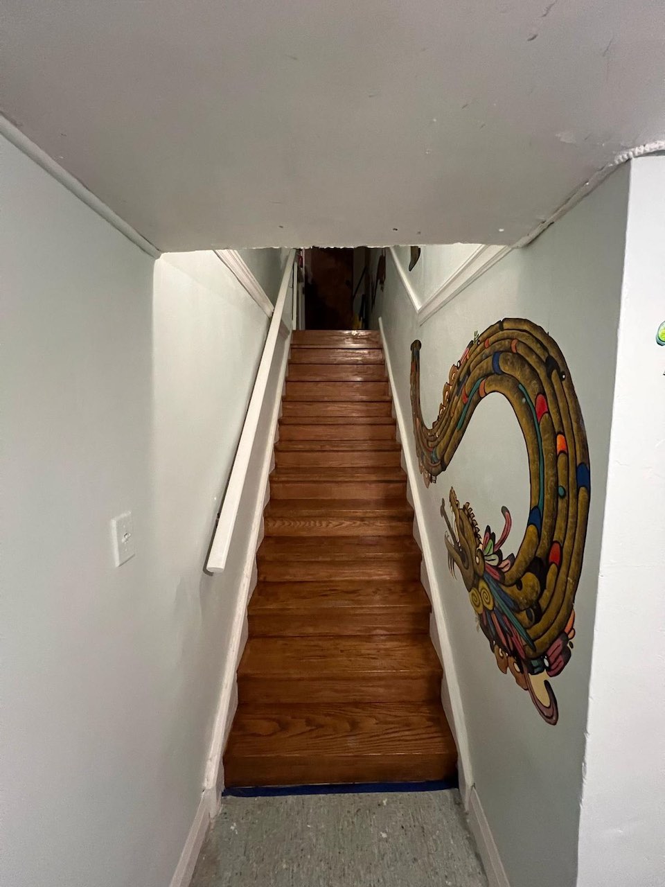 Interior staircase renovation with hardwood finish in Toronto home